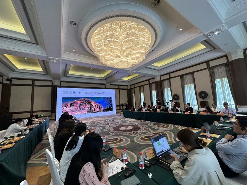 5月30日，“共筑文明共同體——博物館國際合作新愿景”平行論壇在甘肅敦煌舉行。圖為論壇現場。（中新社記者丁思 攝）